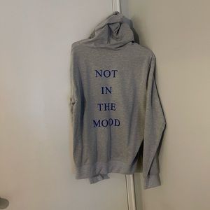 grey hoodie with writing